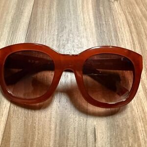 AJ MORGAN Red sunglasses with brown lenses